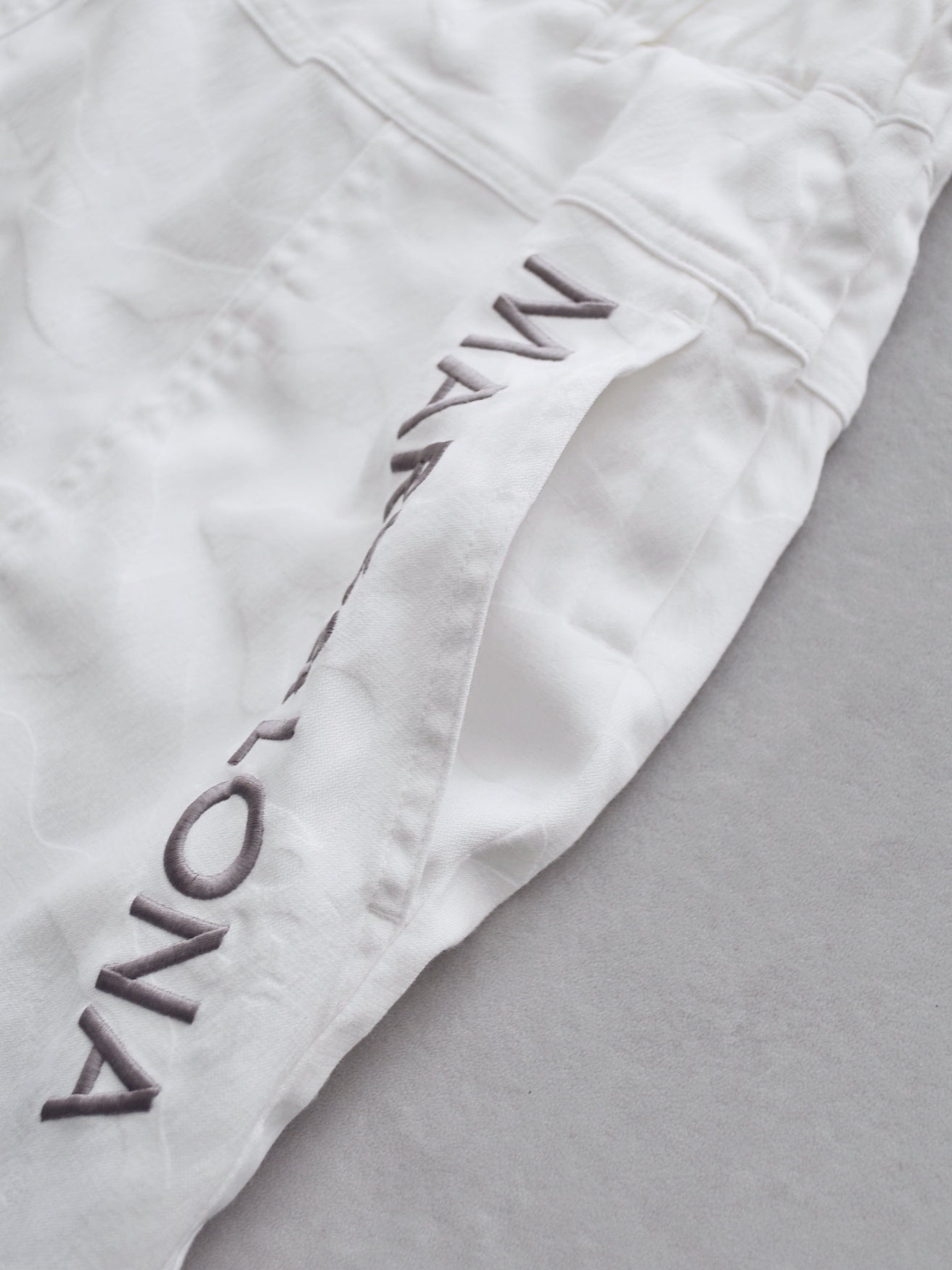 Gauge Trapeze Mini Skirt | WOMEN / WHITE