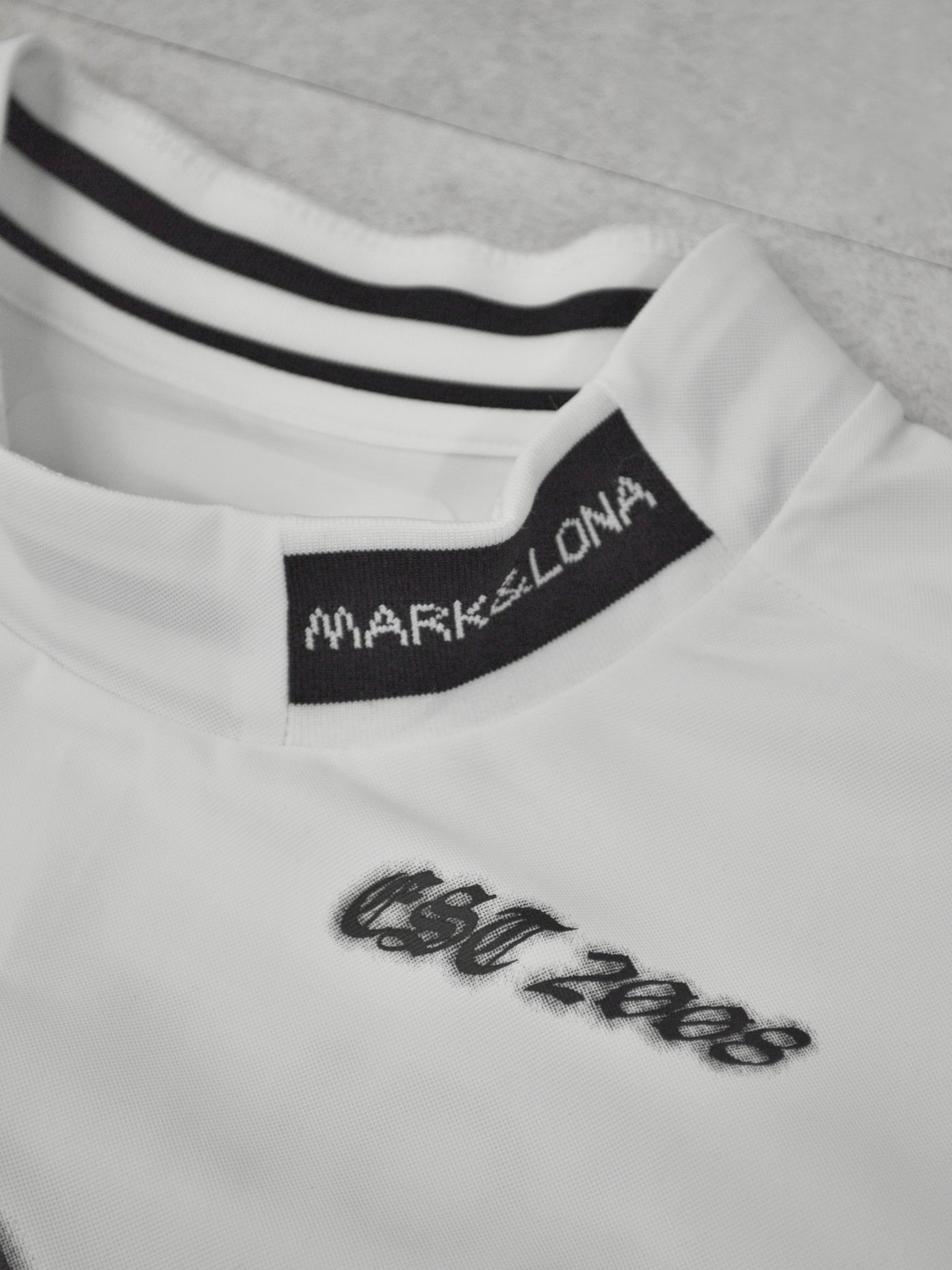 Icon Skull Stretch Nylon Piqué Mock | MEN / WHITE